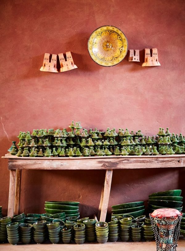green bowl lot under wooden table