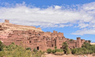 a large building on a hill